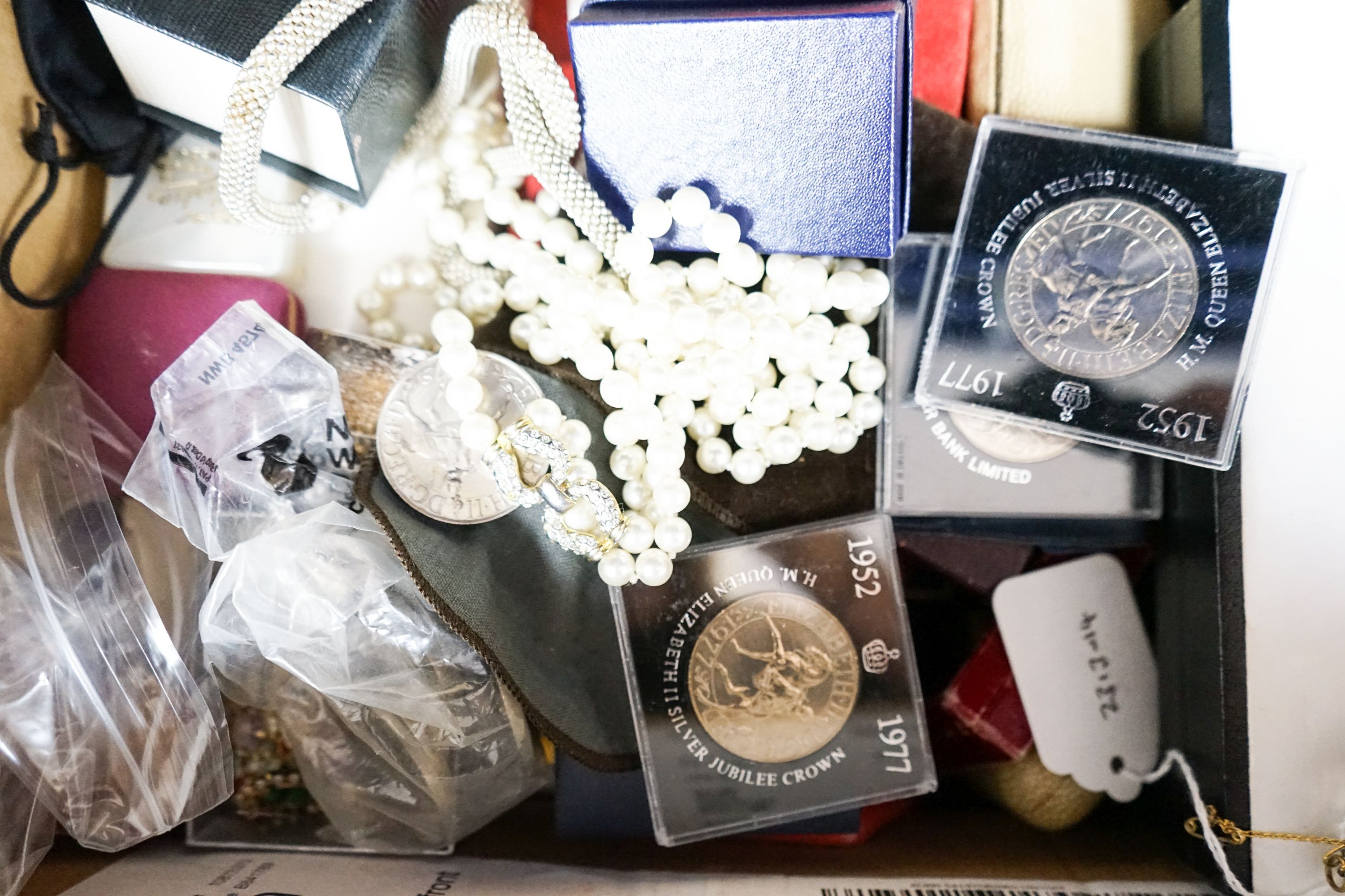 A group of assorted costume jewellery etc. including some small silver, a 9ct gold and two stone cultured pearl crossover ring, a yellow metal overlaid spy glass, commemorative coins and a large yellow metal mounted oval